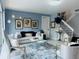 Bright living room with stylish decor, comfortable seating, and staircase access at 5360 Davini St, Sarasota, FL 34238