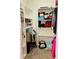 Organized walk-in closet featuring shelving for clothes, shoes, and storage accessories for maximized closet space at 5360 Davini St, Sarasota, FL 34238