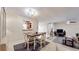 Open dining area seamlessly connected to the living room and kitchen at 5727 25Th W St, Bradenton, FL 34207