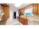 Traditional eat-in kitchen with stainless steel appliances and granite countertops provides modern convenience at 5727 25Th W St, Bradenton, FL 34207