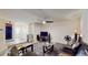 Bright living room with a ceiling fan and comfortable seating arrangement at 5727 25Th W St, Bradenton, FL 34207