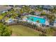 Resort-style community pool and spa surrounded by lush landscaping and comfortable lounging areas at 6255 Cassia St, Bradenton, FL 34203