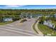 Community entrance with manicured landscaping and signage at 6255 Cassia St, Bradenton, FL 34203