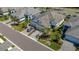 Aerial view of home with a paved driveway and lush landscaping at 6255 Cassia St, Bradenton, FL 34203