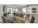 Open-concept floor plan featuring the living room, dining room, and kitchen at 6255 Cassia St, Bradenton, FL 34203
