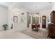 Formal dining area with tile floors and chandelier at 7159 Westhill Ct, Lakewood Ranch, FL 34202