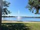 Scenic lake view featuring a central water fountain and serene waters at 7159 Westhill Ct, Lakewood Ranch, FL 34202