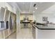 Well-equipped kitchen with modern appliances, sleek countertops, and an open design at 7710 Lake Vista Ct # 407, Lakewood Ranch, FL 34202