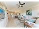 Bright and airy living space with comfortable seating, open to the dining area, and modern decor at 7710 Lake Vista Ct # 407, Lakewood Ranch, FL 34202