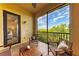 Inviting patio with comfortable seating and scenic views, accessible from the interior at 7710 Lake Vista Ct # 407, Lakewood Ranch, FL 34202