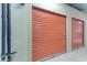 Secure storage unit with roll-up door, providing convenient space for belongings at 7710 Lake Vista Ct # 407, Lakewood Ranch, FL 34202