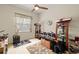 Bedroom with a ceiling fan and carpet flooring at 8271 47Th Street E Cir, Palmetto, FL 34221