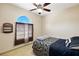 Bedroom with window and ceiling fan at 8271 47Th Street E Cir, Palmetto, FL 34221