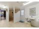 Light and airy bathroom with walk-in shower, stylish vanity, and adjacent access at 108 Martin Ne Dr, Port Charlotte, FL 33952