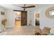 Bonus space featuring hardwood floors, barn door, and comfortable seating at 108 Martin Ne Dr, Port Charlotte, FL 33952