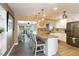 Bright, open kitchen with granite countertops and stainless steel appliances at 108 Martin Ne Dr, Port Charlotte, FL 33952