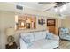 Cozy living room featuring a pass-through to the kitchen, comfortable seating, and modern decor at 108 Martin Ne Dr, Port Charlotte, FL 33952