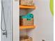 Organized bathroom shelves provide convenient storage next to the shower at 11 1St E St, Nokomis, FL 34275
