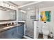Elegant bathroom with a glass-enclosed shower, modern vanity, and stylish finishes for a luxurious and comfortable experience at 11 1St E St, Nokomis, FL 34275