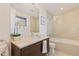 Modern bathroom featuring a soaking tub and a glass-enclosed shower at 1155 N Gulfstream Ave # 508, Sarasota, FL 34236
