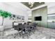 Elegant conference room with large table, stylish chairs, and modern decor for productive meetings at 1155 N Gulfstream Ave # 508, Sarasota, FL 34236