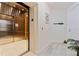 Elevator lobby with an open elevator, tiled floors, and modern finishes at 1155 N Gulfstream Ave # 508, Sarasota, FL 34236