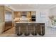Contemporary kitchen with stainless steel appliances and a breakfast bar island at 1155 N Gulfstream Ave # 508, Sarasota, FL 34236