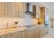 Stylish kitchen with granite counters, stainless appliances, and ample cabinet space at 1155 N Gulfstream Ave # 508, Sarasota, FL 34236