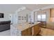 Modern kitchen with granite countertops and stainless steel appliances at 1155 N Gulfstream Ave # 508, Sarasota, FL 34236