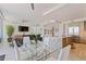 Open-concept living and dining area with modern decor and ample natural light at 1155 N Gulfstream Ave # 508, Sarasota, FL 34236