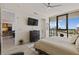 Bright main bedroom with a large window, dresser, and kitchen access at 1155 N Gulfstream Ave # 508, Sarasota, FL 34236