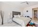 Light-filled bedroom with a large bed, modern decor, and cozy furnishings at 1155 N Gulfstream Ave # 508, Sarasota, FL 34236