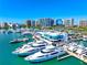 Picturesque marina filled with luxury yachts against a stunning skyline backdrop at 1155 N Gulfstream Ave # 508, Sarasota, FL 34236