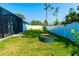 Spacious backyard with a privacy fence, offering ample room for outdoor activities at 13339 Flaherty Ave, Port Charlotte, FL 33981