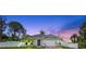 Charming single-Gathering home featuring a well-manicured lawn, vinyl fence and a two-car garage at 13339 Flaherty Ave, Port Charlotte, FL 33981