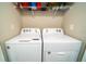 Laundry area with a washer and dryer, providing convenient in-home laundry at 13339 Flaherty Ave, Port Charlotte, FL 33981