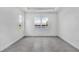 Tranquil bedroom with scenic views of the water from large windows at 17916 Palmiste Dr, Bradenton, FL 34202
