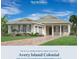 Charming one-story Avery Island Colonial features a symmetrical design, manicured lawn, and paver driveway at 17916 Palmiste Dr, Bradenton, FL 34202