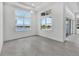 Bright living room with large windows offering beautiful water views at 17916 Palmiste Dr, Bradenton, FL 34202
