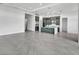 Open floor plan showcasing herringbone floors, recessed lighting, and a stylish kitchen at 17916 Palmiste Dr, Bradenton, FL 34202