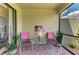 Screened patio with comfortable seating, perfect for enjoying the outdoors in comfort at 19889 Benissimo Dr, Venice, FL 34293