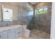 Clean bathroom featuring modern finishes, tiled shower and a unique view outside at 2375 Floyd St, Sarasota, FL 34239