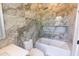 This bathroom boasts marble tiling, glass shower, and built in shower niche at 2375 Floyd St, Sarasota, FL 34239