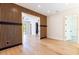 Spacious room with black slat wall feature, and hardwood flooring at 2375 Floyd St, Sarasota, FL 34239
