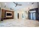 Spacious living room with decorative wall panels, modern fixtures, and elegant staircase at 2375 Floyd St, Sarasota, FL 34239