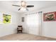 Serene bedroom with natural light, carpet, and neutral colors, creating a peaceful retreat at 2933 Mayflower St, Sarasota, FL 34231