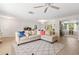 Bright living room with stylish furniture, light-colored walls, and an open layout at 2933 Mayflower St, Sarasota, FL 34231
