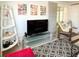 Living room featuring a TV and decor, providing a comfortable entertaining space at 3414 Spanish Oak Ter, Sarasota, FL 34237