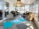 Enclosed sun room area features ample windows and natural light at 3414 Spanish Oak Ter, Sarasota, FL 34237