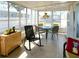 Enclosed sun room area features ample windows and natural light at 3414 Spanish Oak Ter, Sarasota, FL 34237